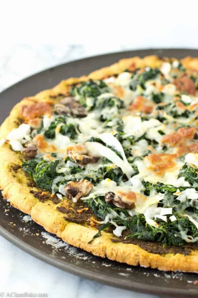 Grain Free Thin Crust Pizza topped with Homemade Pesto and Veggies (gluten-free and paleo)