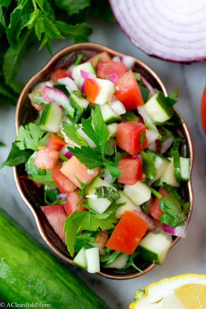 Fresh, crisp and hydrating Jerusalem Salad - you'll want to eat this every day this summer! (It's raw, vegan, gluten free and paleo, too!)