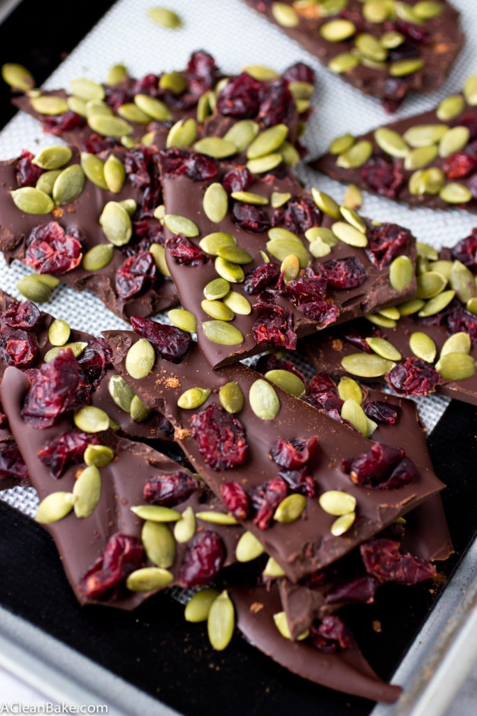 Cranberry pumpkin seed dark chocolate bark tastes just like fall and is super simple to whip up with only 4 ingredients! (gluten free, grain free, paleo, and vegan)
