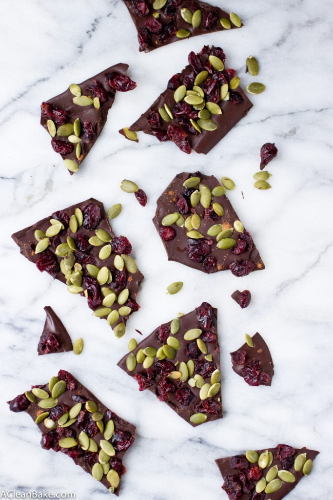 Cranberry pumpkin seed dark chocolate bark tastes just like fall and is super simple to whip up with only 4 ingredients! (gluten free, grain free, paleo, and vegan)