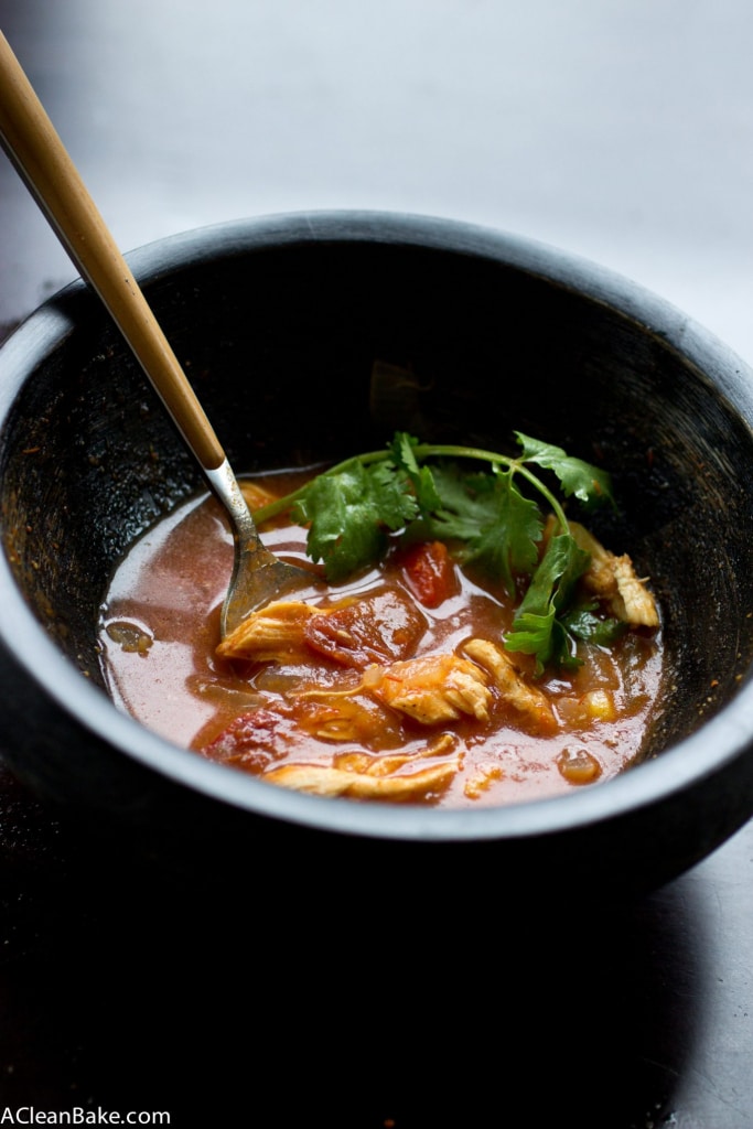 Chicken Tortilla Soup is a family favorite that comes together quickly and easily. Make a pot and have leftovers for a week! This version is topped with gluten free and grain free tortilla strips.