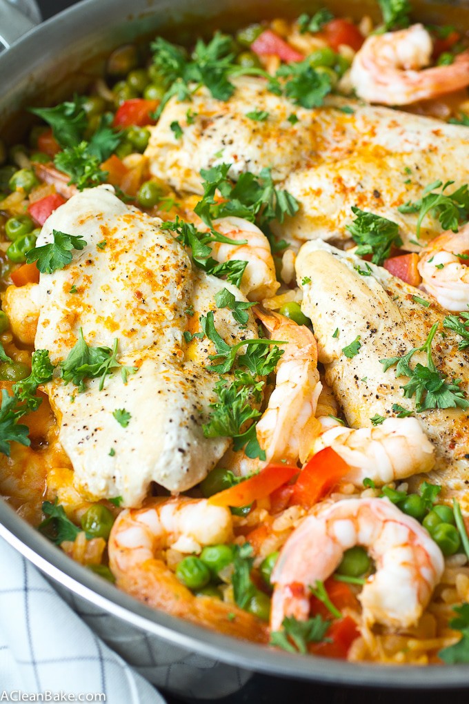 30 Minutes and one pan is all it takes to make paella for dinner tonight! And no, you don't need a special paella pan - don't worry. Bonus: It's naturally gluten free, too!