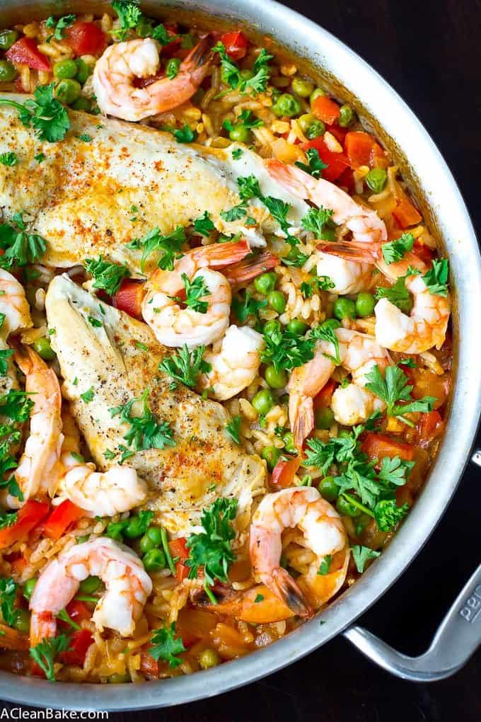 30 Minutes and one pan is all it takes to make paella for dinner tonight! And no, you don't need a special paella pan - don't worry. Bonus: It's naturally gluten free, too!
