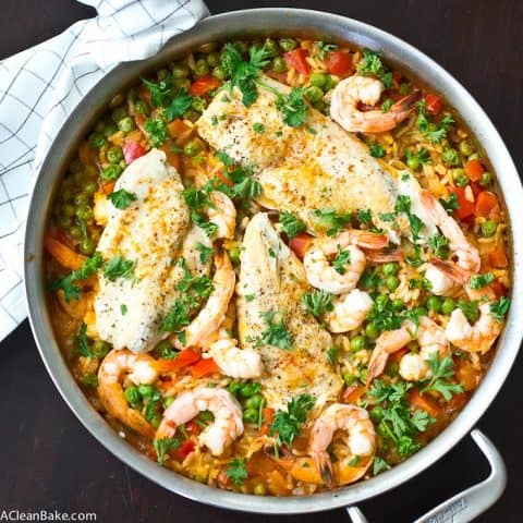 30 Minutes and one pan is all it takes to make paella for dinner tonight! And no, you don't need a special paella pan - don't worry. Bonus: It's naturally gluten free, too!