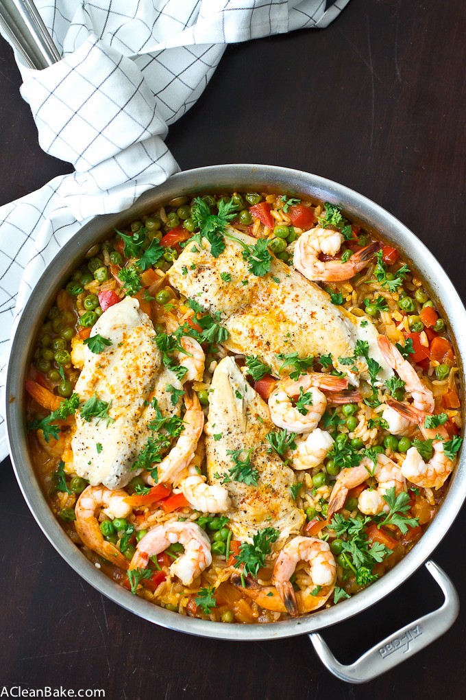 30 Minutes and one pan is all it takes to make paella for dinner tonight! And no, you don't need a special paella pan - don't worry. Bonus: It's naturally gluten free, too!