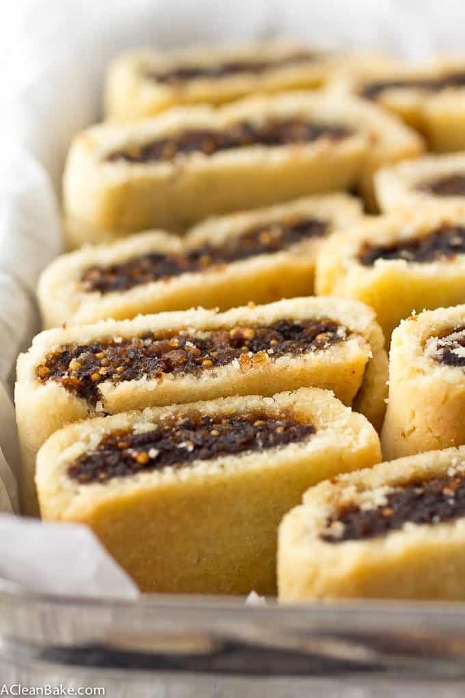 Homemade fig newtons in a pastry box with tissue. This gluten free and paleo fig newton recipe is delicious, all natural, and fun! 