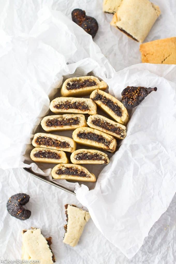 Homemade fig newtons in a pastry box with tissue. This gluten free and paleo fig newton recipe is delicious, all natural, and fun! 