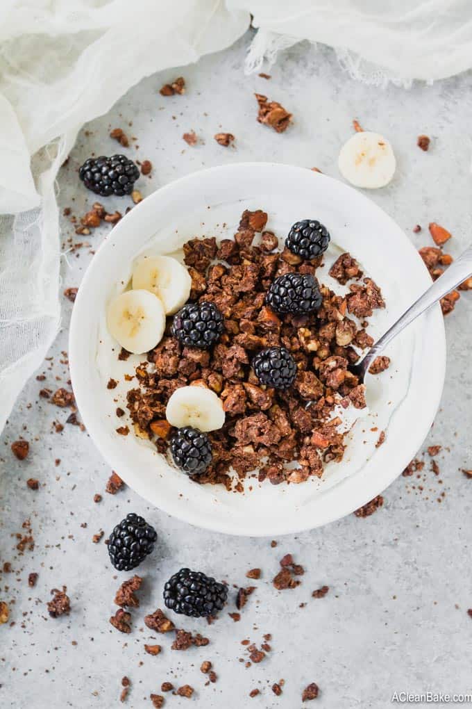 Paleo granola is a hearty, delicious homemade breakfast cereal that is made from nuts, coconut, and chocolate! This gluten free, dairy free, and lower carb paleo granola is irresistible!