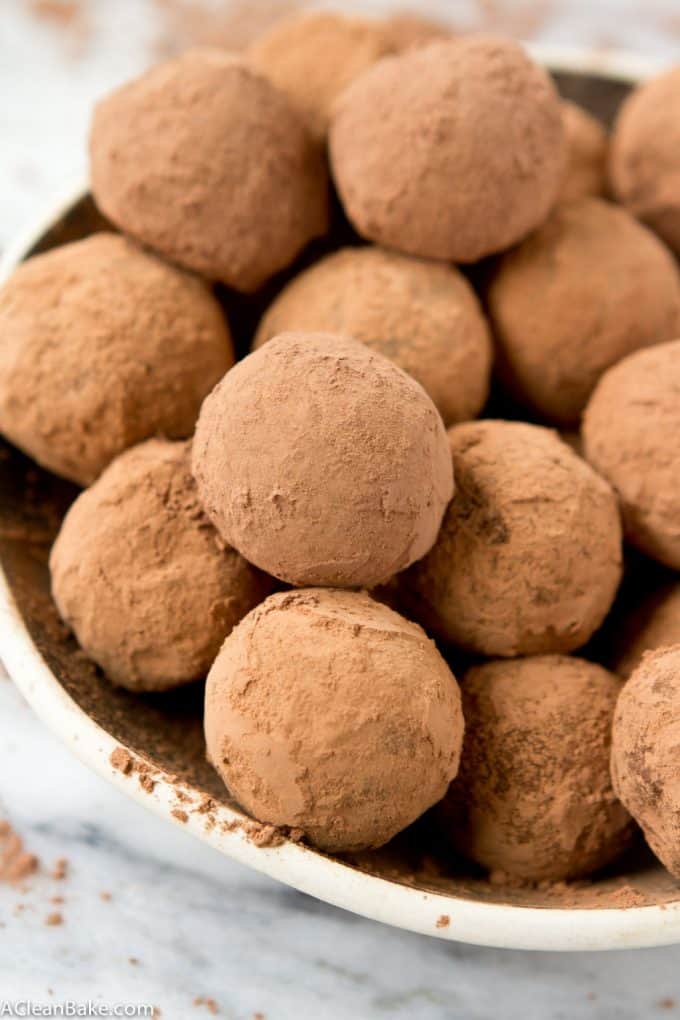 Paleo and Vegan HEALTHY chocolate truffles! You won't believe how easy it is to make these no-bake chocolate treats. #glutenfree #Paleo #glutenfreerecipes #paleorecipes #glutenfreechristmas #paleochristmas #paleodesserts #vegandesserts #glutenfreedesserts #paleochocolate #healthydessert #healthychristmas #dairyfree #vegan #veganrecipes #vegan #veganchristmas #lowcarb #lowcarbrecipes #lowcarbdessert #lowcarbchristmas