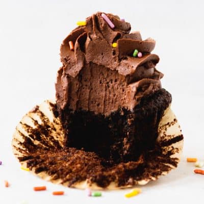 This is the BEST Chocolate Buttercream Frosting Recipe you'll try. It's made with less sugar, so the chocolate flavor shines through! The texture is rich and silky. Everyone loves this easy chocolate buttercream frosting! #glutenfree #cakes #cakedecorating #frosting #dessert #dessertrecipe #dessertrecipes #cakerecipe #cakerecipes