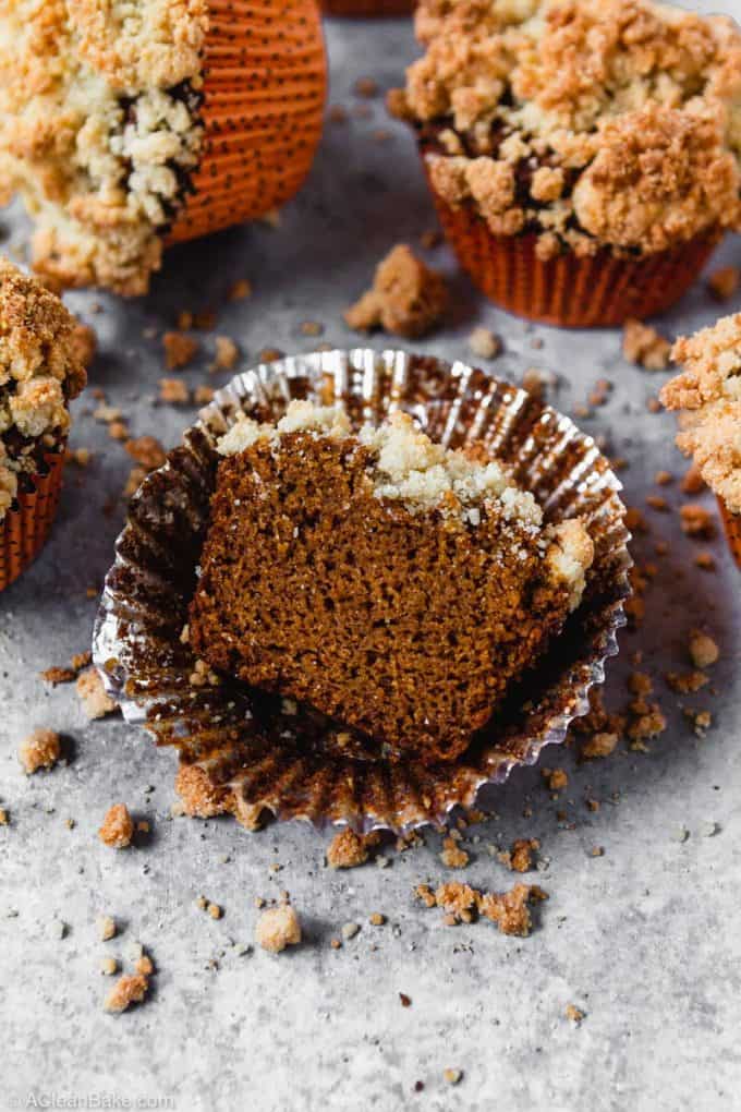 half paleo pumpkin muffin on the table