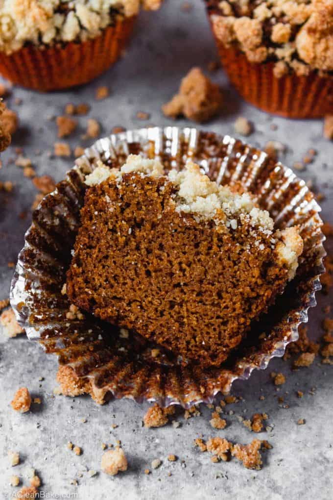 half paleo pumpkin muffin on the table