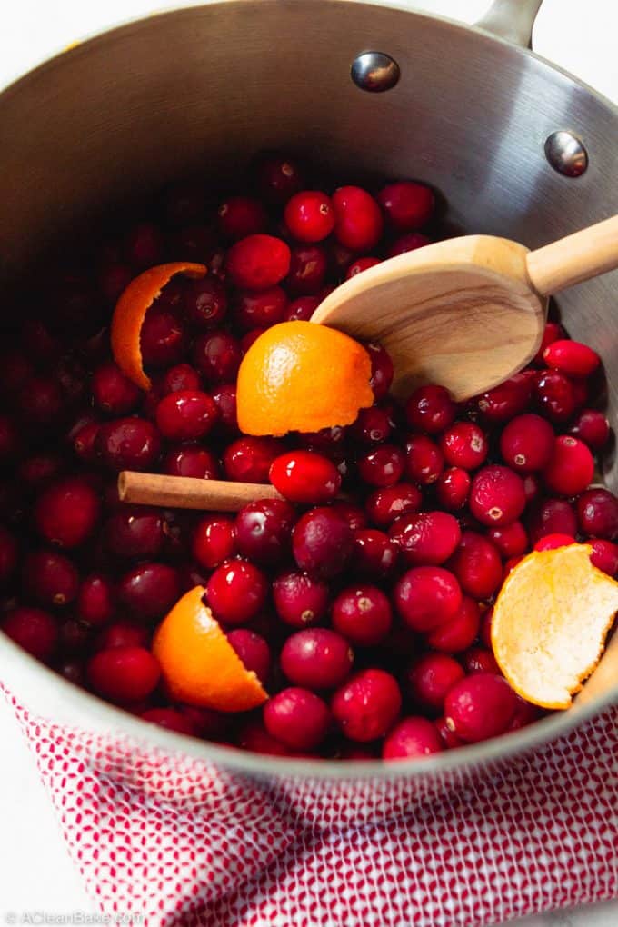 Pot of ingredients for vegan and paleo cranberry sauce