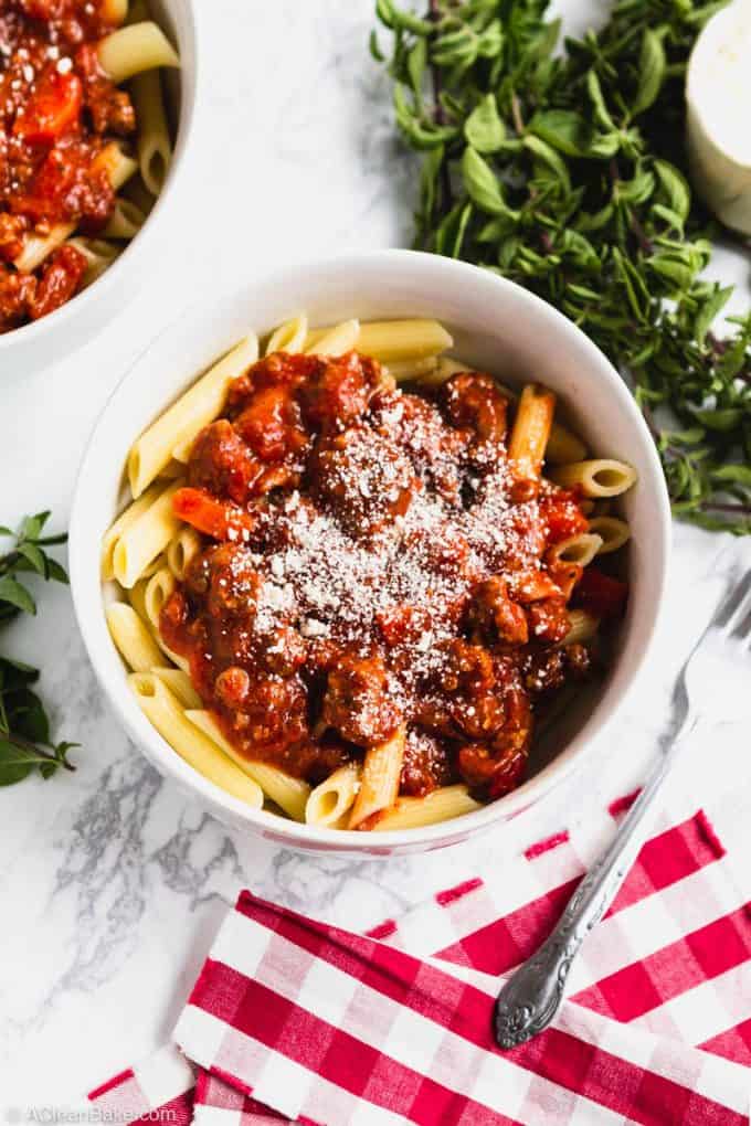 Slow Cooker Bolognese Sauce in a Bowl with a fork