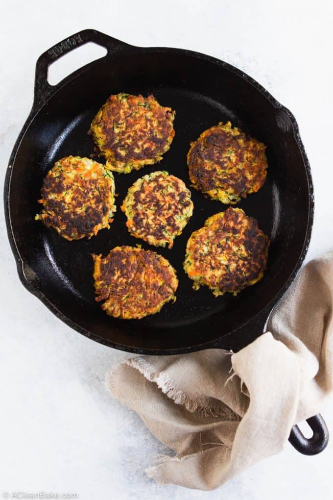 Paleo gluten free vegetable fritters in a cast iron pan