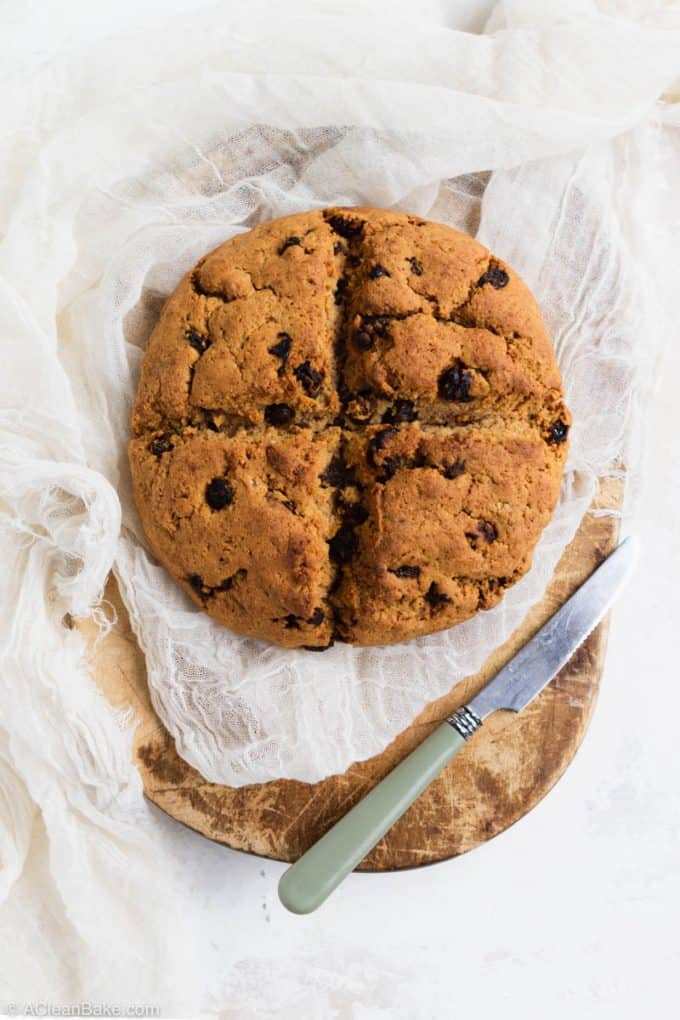 Loaf of paleo gluten free irish soda bread on a cutting board