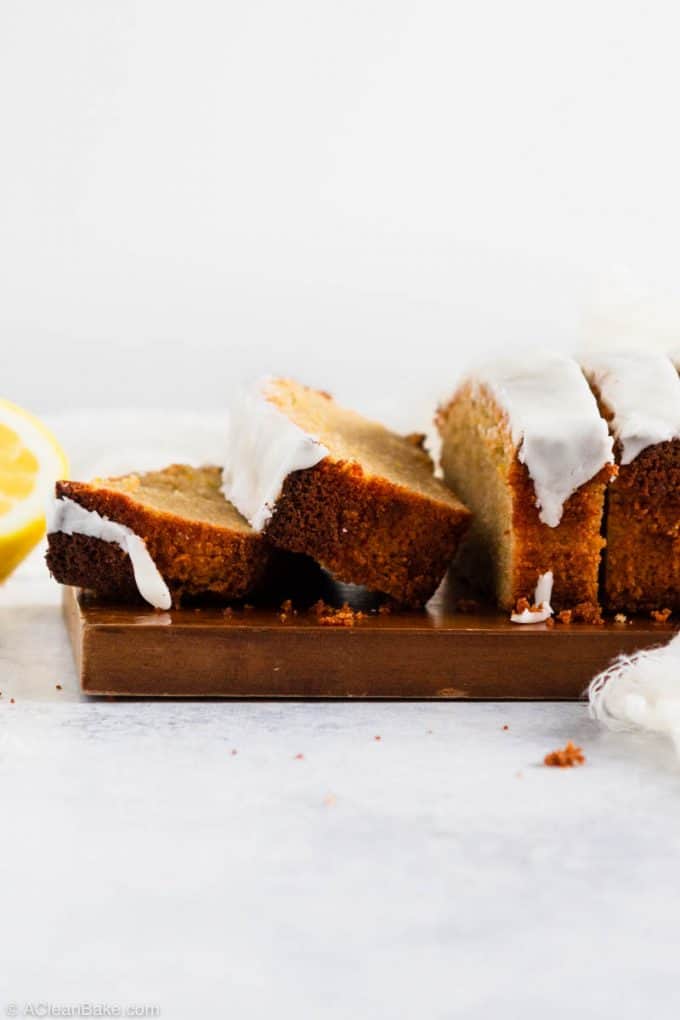 Sliced loaf of paleo and gluten free lemon pound cake on a cutting board