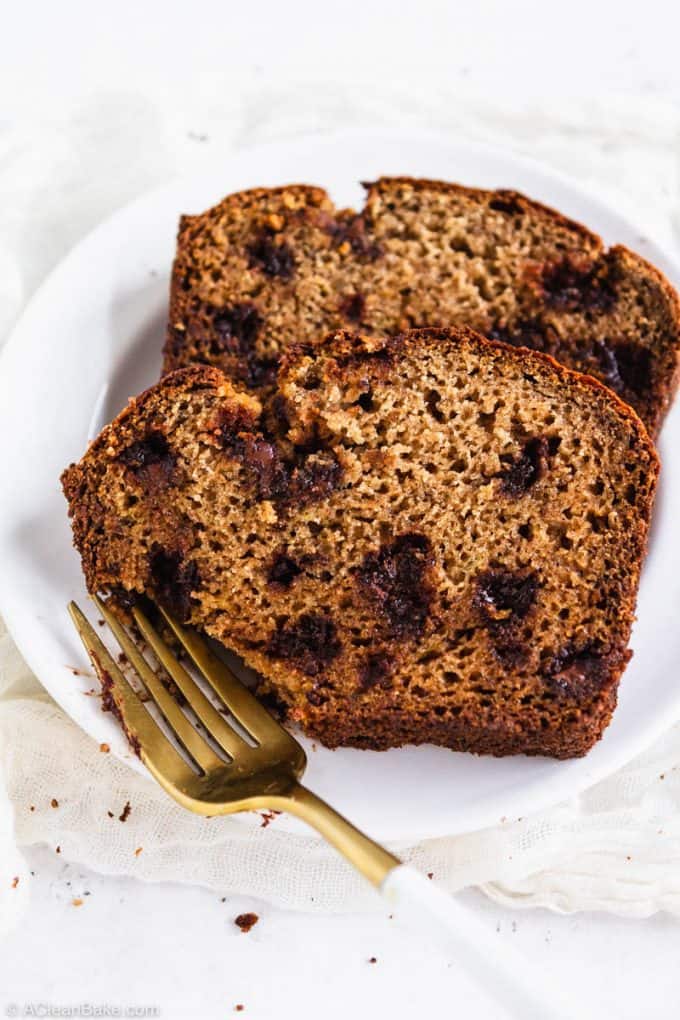 Slices of paleo gluten free banana bread on a plate with a fork