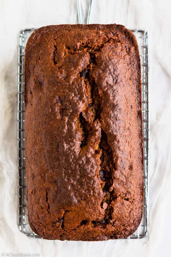 Loaf of paleo gluten free banana bread on a cooling rack