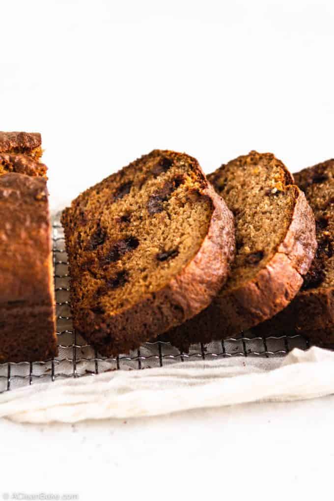Slices of paleo gluten free banana bread on a cooling rack