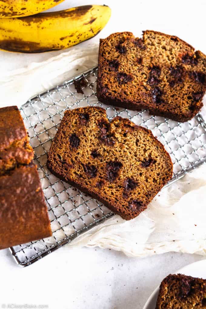 Slices of paleo gluten free banana bread on a cooling rack