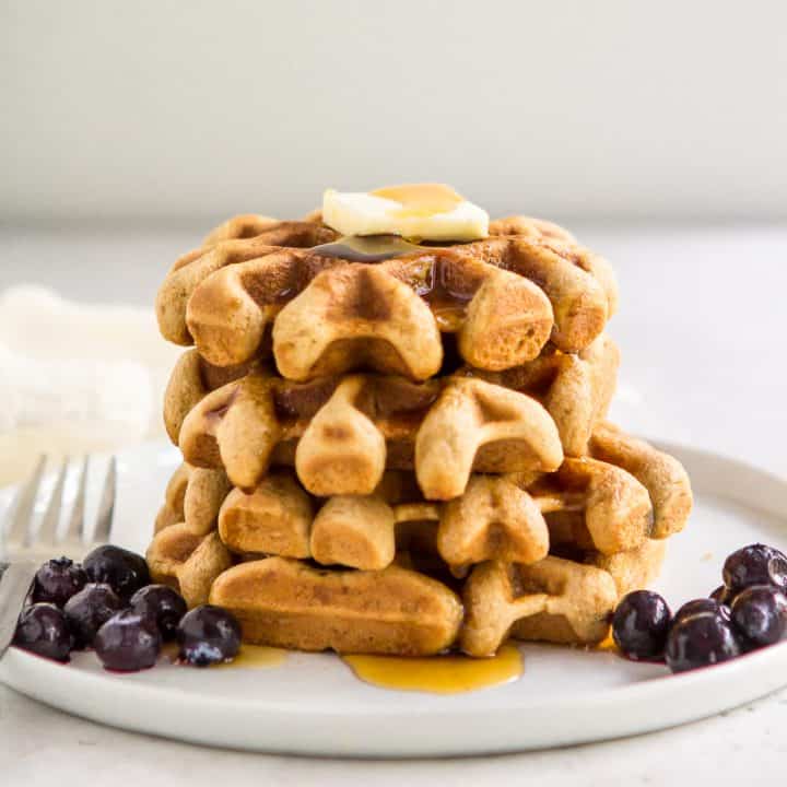 Stack of paleo gluten free waffles on a plate