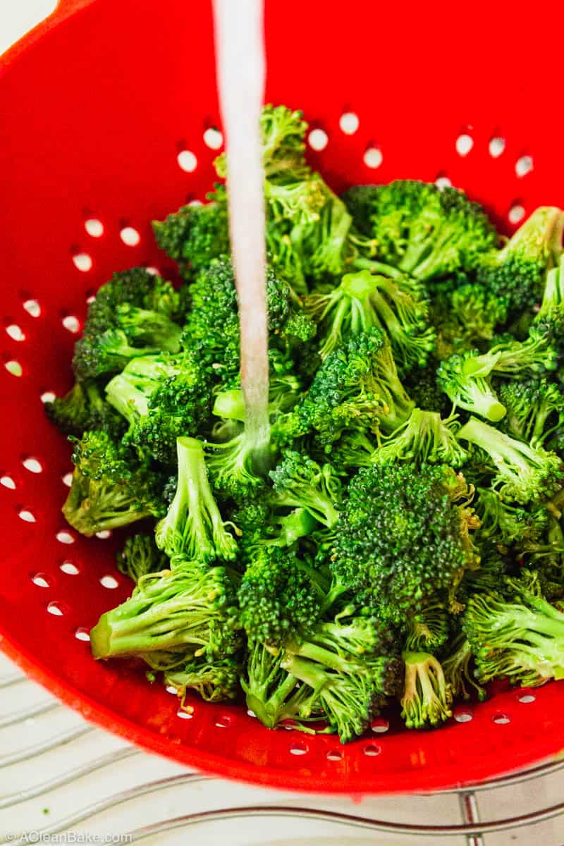 How to Freeze Broccoli: broccoli being rinsed