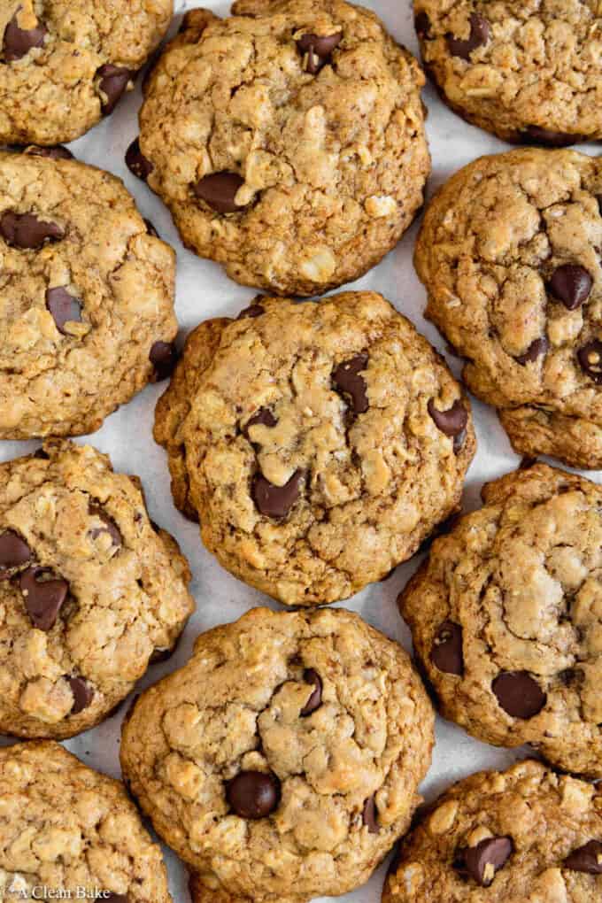 Pile of gluten free oatmeal chocolate chip cookies on a table