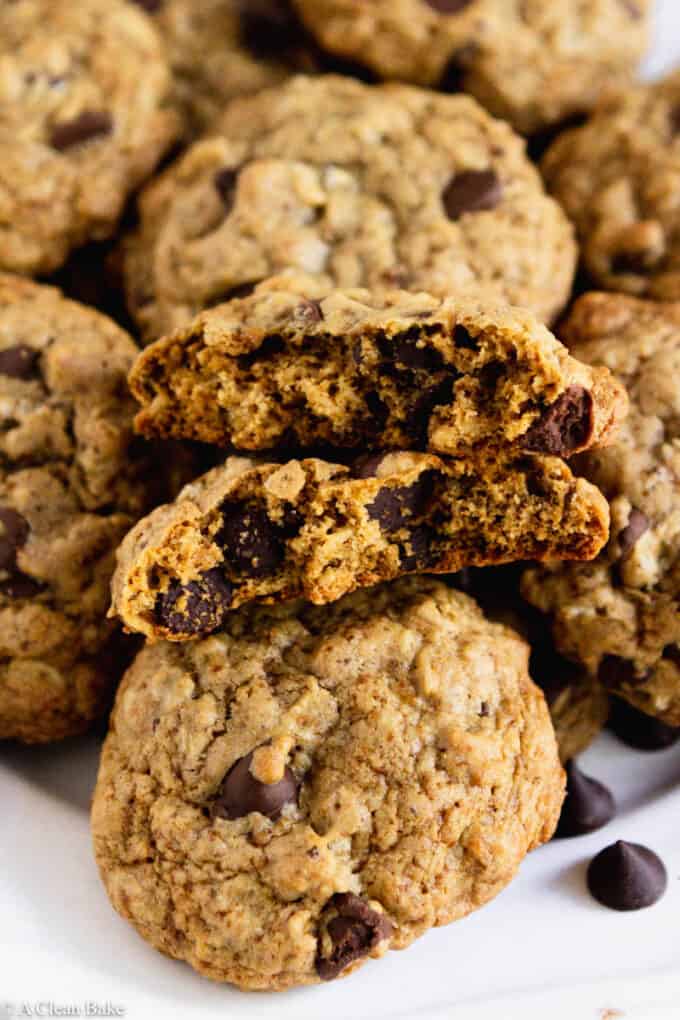 Pile of gluten free oatmeal chocolate chip cookies on a plate