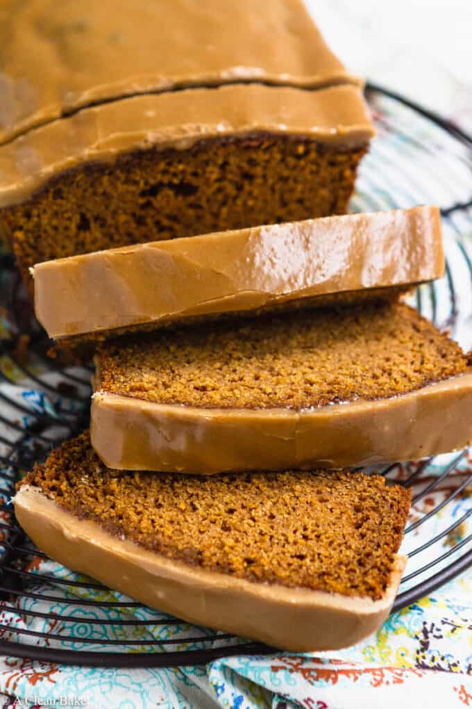 Sliced loaf of gluten free pumpkin bread on a cooling rack