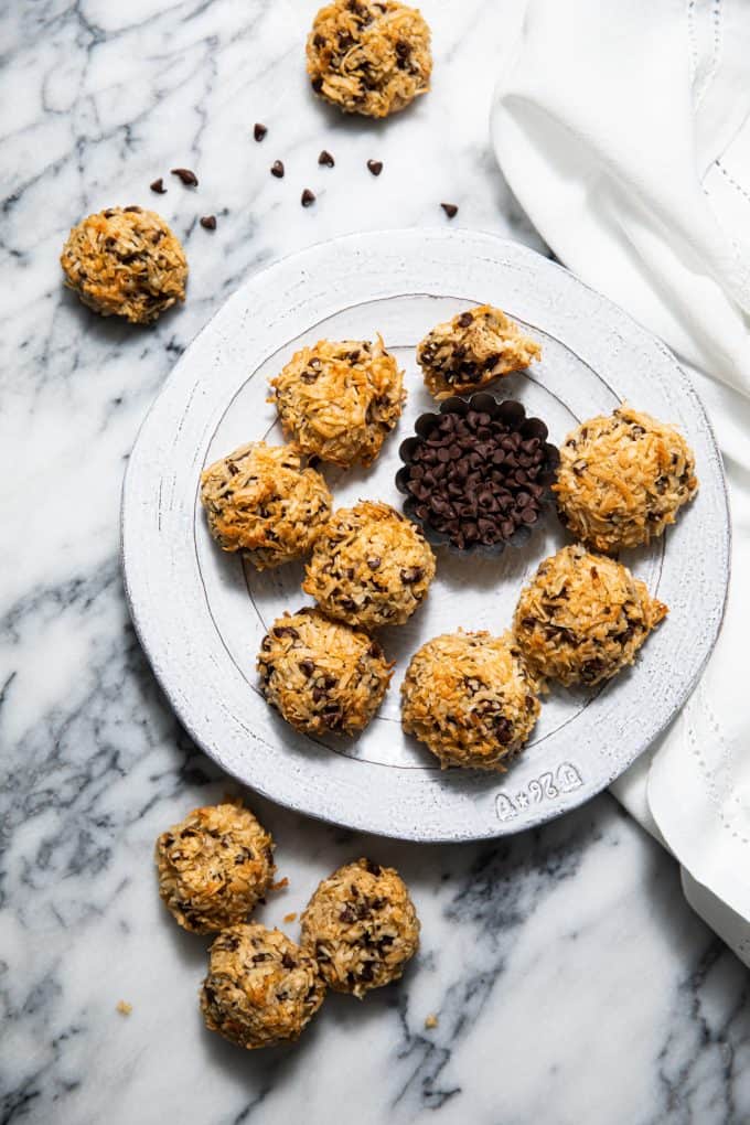 Chocolate Chip Coconut Macaroons on a platter on a marble table